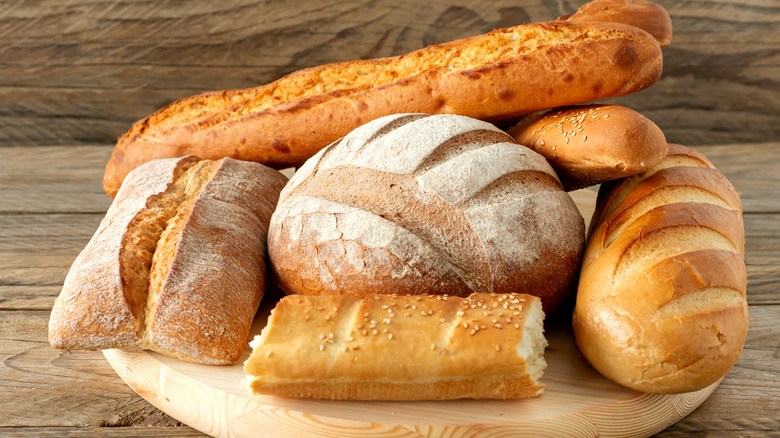 Various loaves of bread on a tray