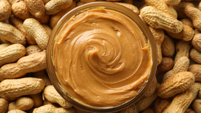 peanut butter jar with whole peanuts