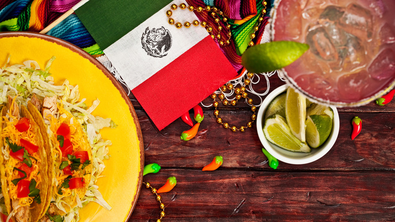 tacos, margarita, and Mexican flag