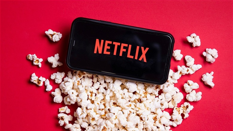 Netflix phone app and popcorn