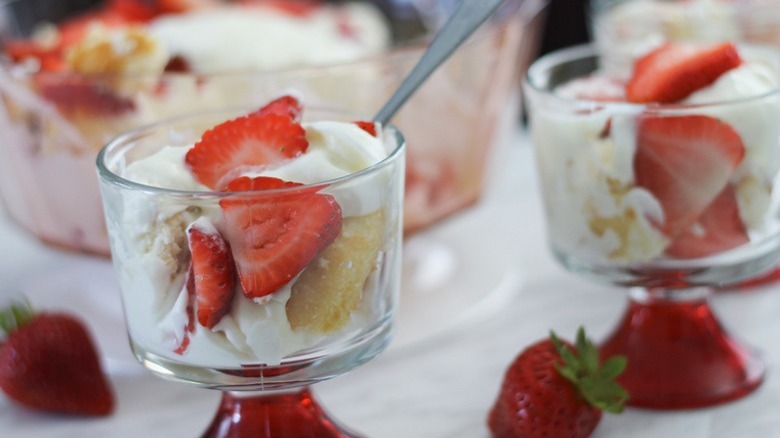 strawberries whipped cream and cake