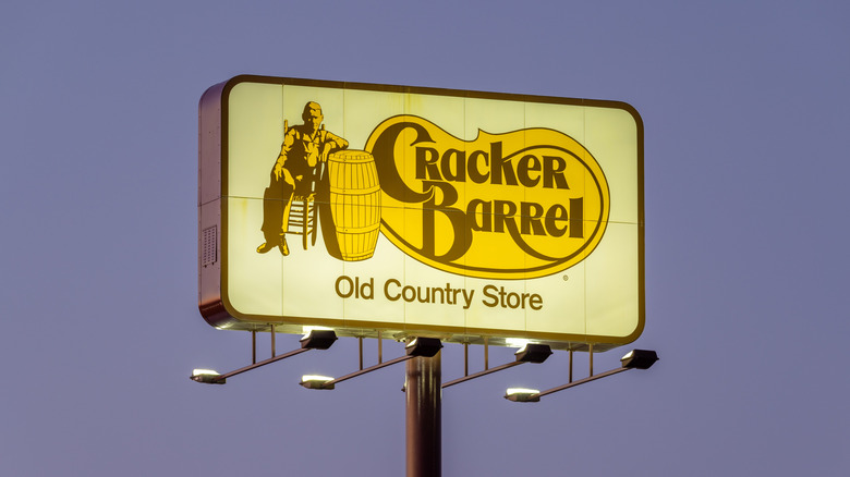 Cracker Barrel lighted sign at night