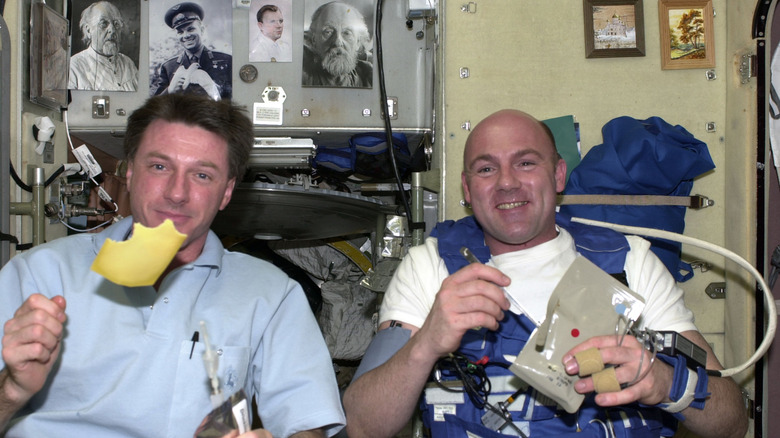 Astronauts eating in space