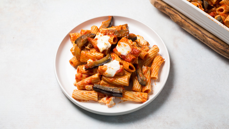 eggplant pasta served on table