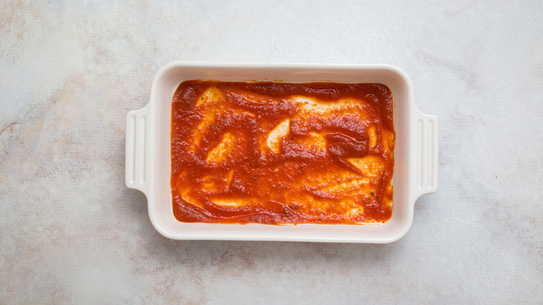 sauce spread in baking dish