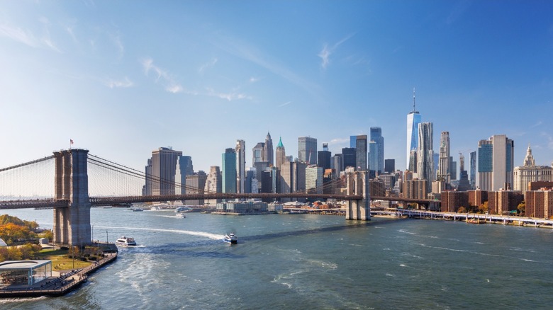 New York City skyline behind Brooklyn Bridge