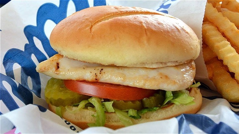 Grilled chicken sandwich and french fries on tray at Culver's