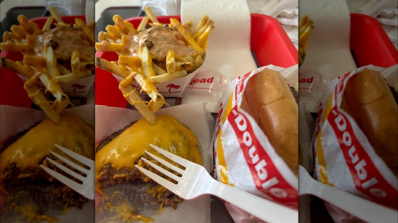 A Flying Dutchman-style burger and other items on tray at In-N-Out.