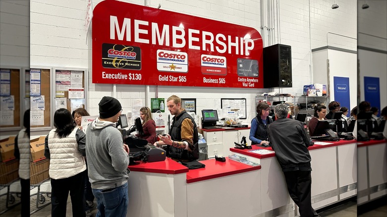 Shoppers in line at Costco's membership desk