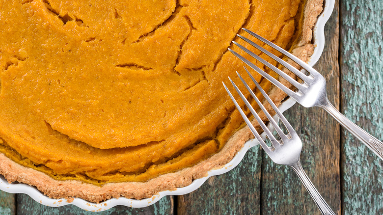 Closeup of a cracked top of a pumpkin pie