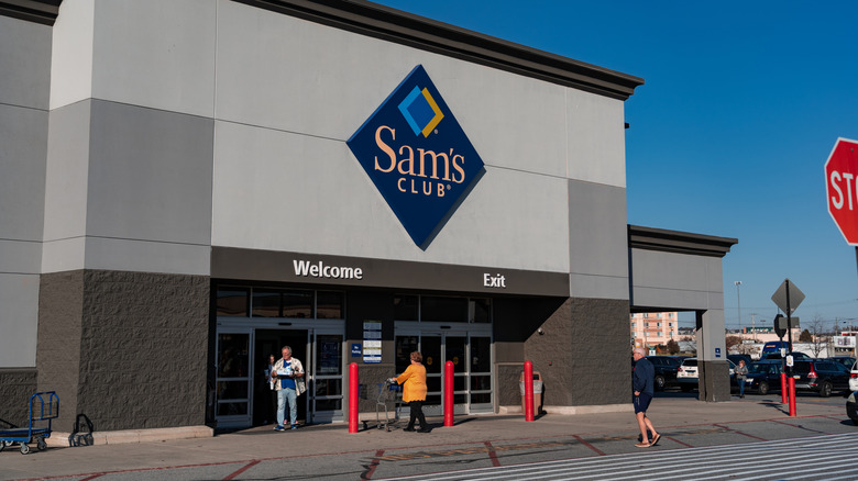 sam's club storefront with shoppers during daytime