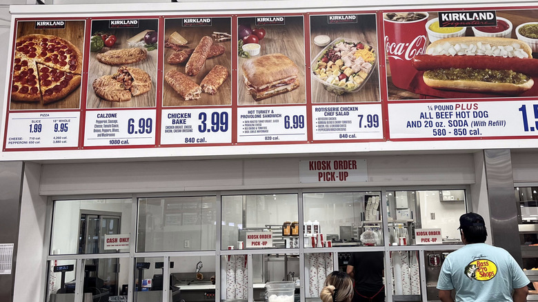 Customers standing in front of the store food court.