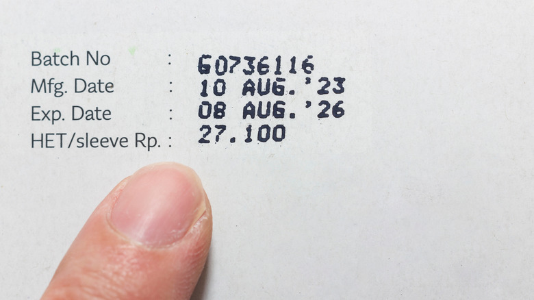 Finger pointing at expiry date