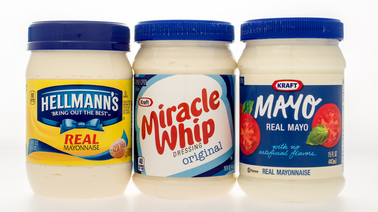 Side-by-side jars of Miracle Whip, Hellmann's Mayo, and Kraft Mayo