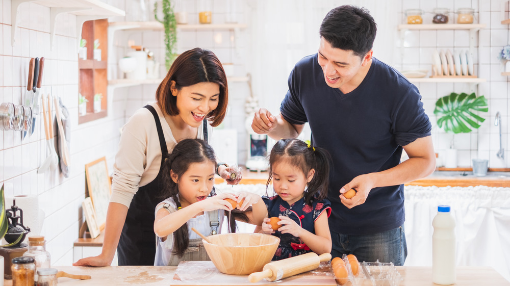 Family cooking a meal together