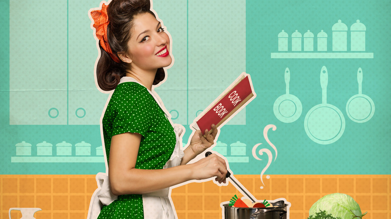 retro-looking woman with cookbook