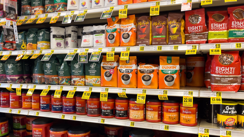 Different types of coffee on supermarket shelves