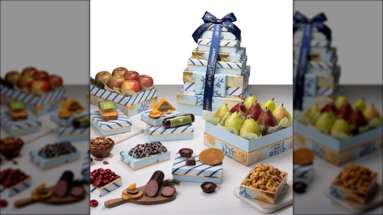 gift box set with fruit, meats, snacks, and other items