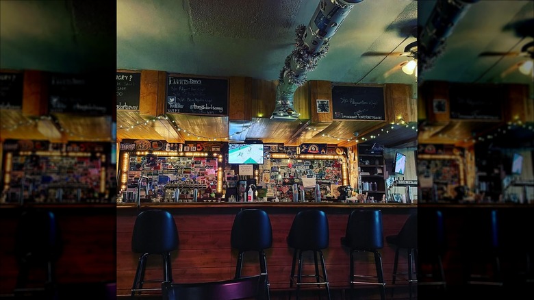 Bar with stickers at Tony's Darts Away