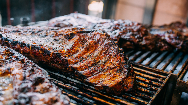 Cooked ribs on grill grate