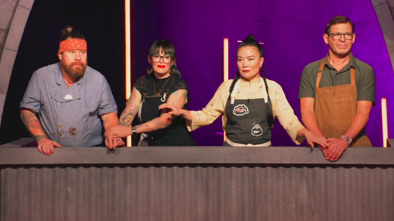 chefs on House of Knives wait during an elimination round