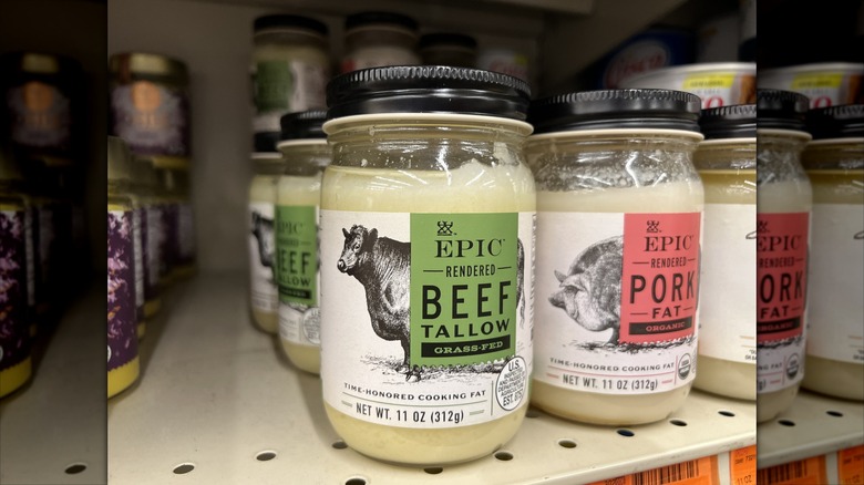 jars of rendered beef tallow on grocery store shelf