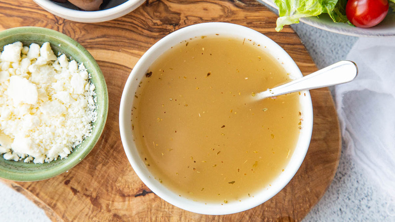 salad dressing in white bowl