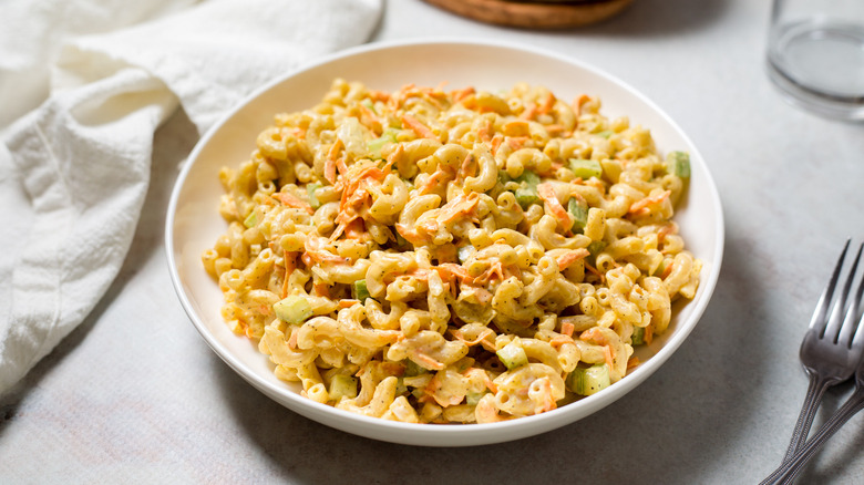 macaroni salad served on table