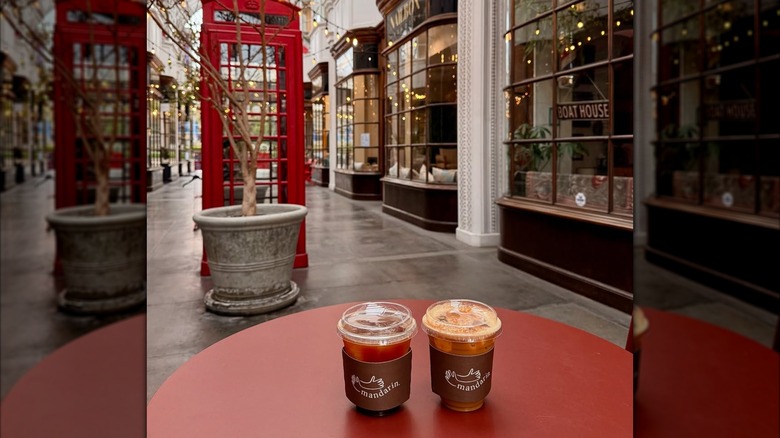 Two cups of iced coffee in the shopping arcade