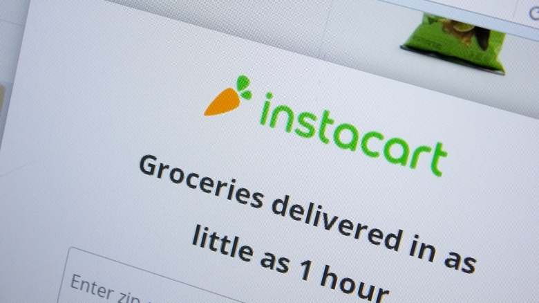 Computer screen displaying Instacart logo.