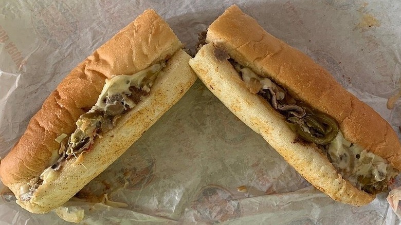 The #99 sub from Jersey Mike's with meat, cheese, onions, and peppers.
