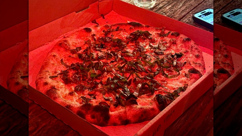 pizza from park pizza under a red light