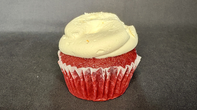 red velvet cupcake with white frosting from Magnolia Bakery