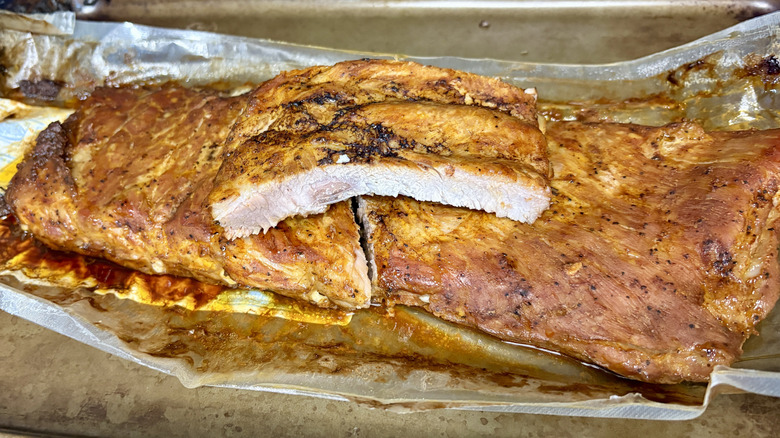 Cooked Kroger St Louis ribs on pan