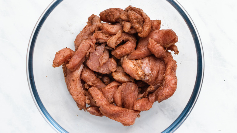 pork in a glass bowl 