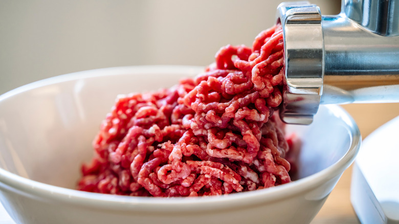 Meat grinder in action