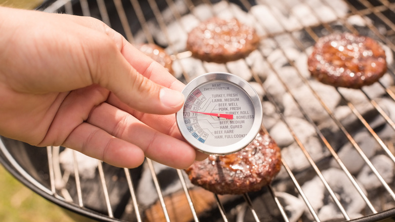 Holding thermometer in burger patty
