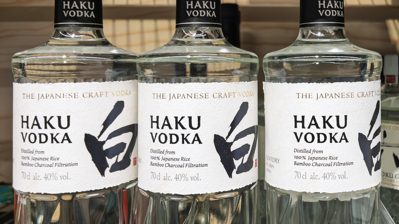 Closeup of three bottles of Haku vodka