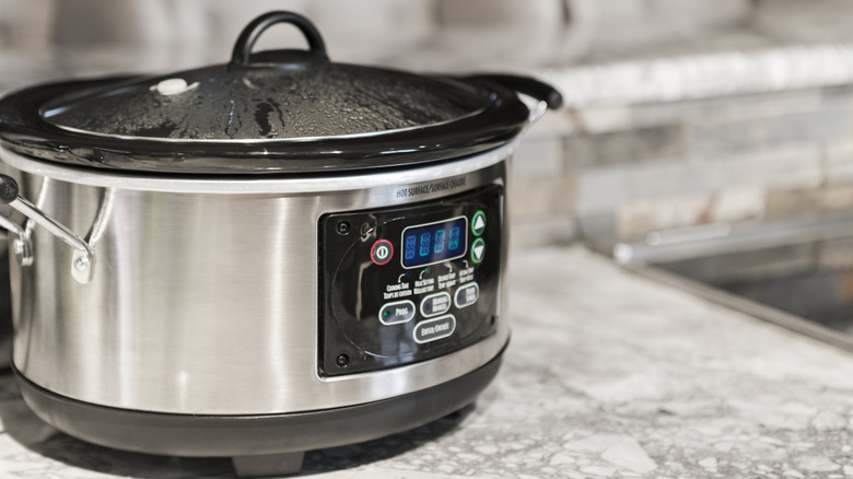 A slow cooker on countertop.
