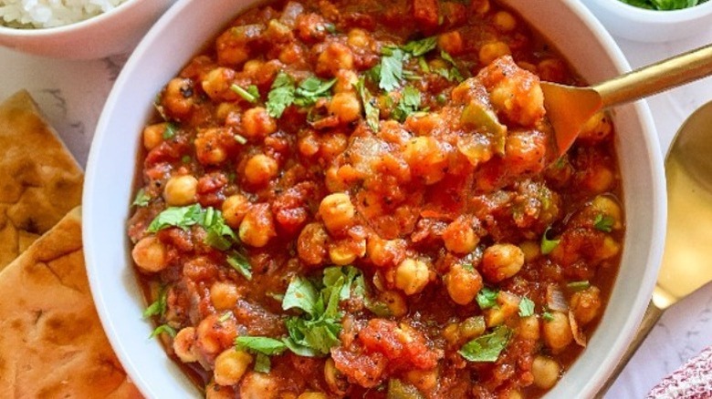 chickpea curry in white bowl