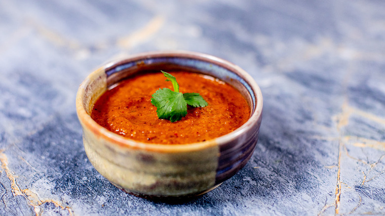bowl of salsa with garnish