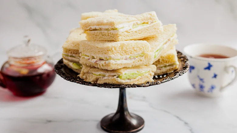 serving tray with cucumber sandwiches and tea