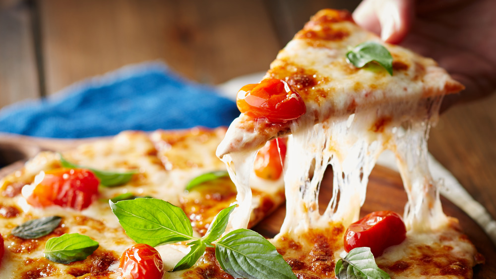 Margherita pizza with tomato, basil, and cheese