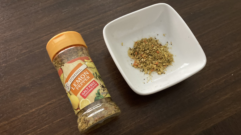 Stonemill Lemon Pepper Salt Free Seasoning in a small dish, next to the jar