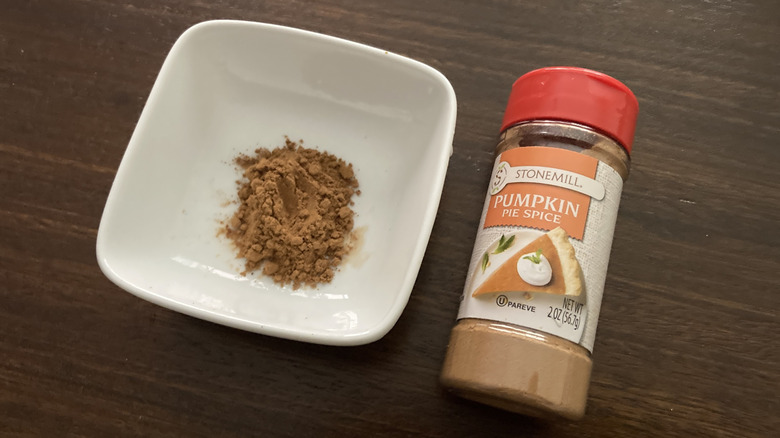 Stonemill Pumpkin Pie Spice from Aldi in a small dish, next to the jar
