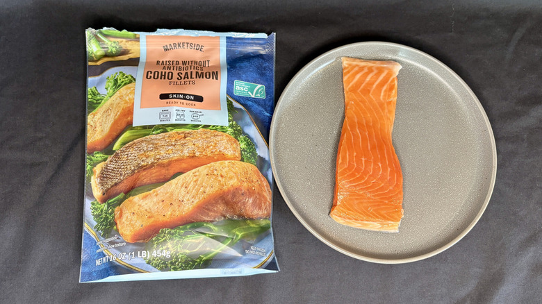 Fillet of salmon next to Marketside packaging