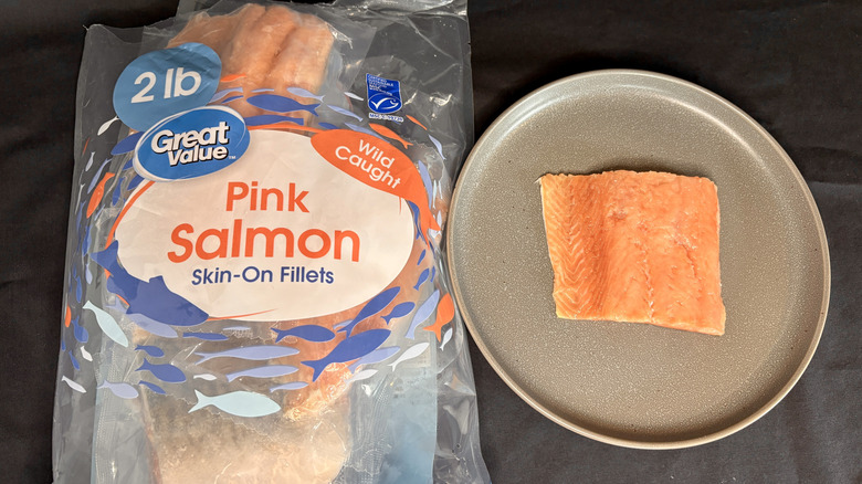 Fillet of salmon next to Great Value packaging
