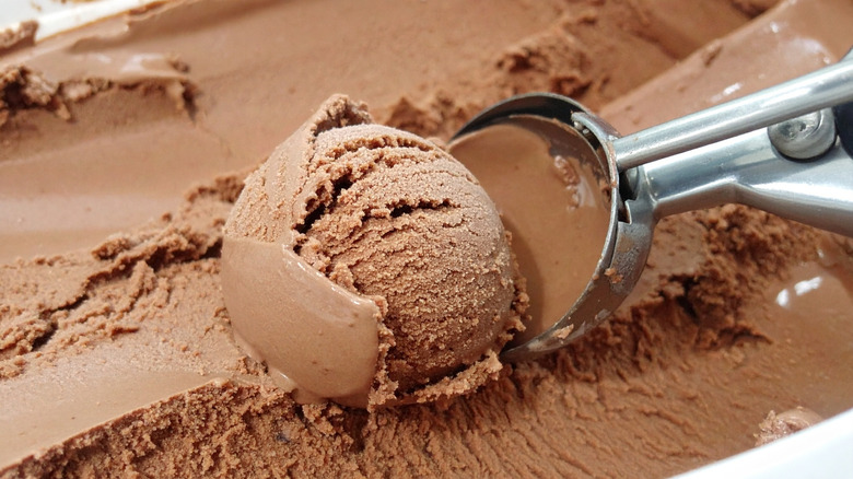 chocolate ice cream being scooped
