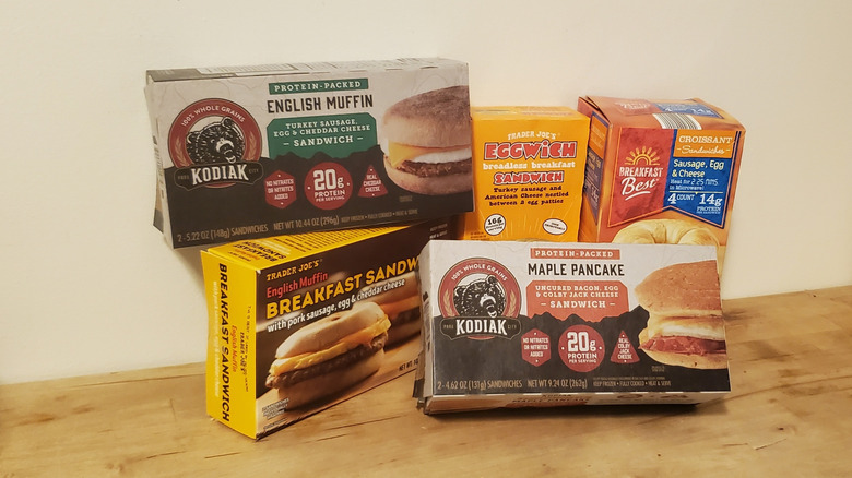 a stack of boxes containing breakfast sandwiches