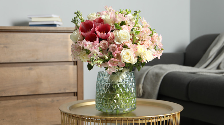 Vase of flowers on table